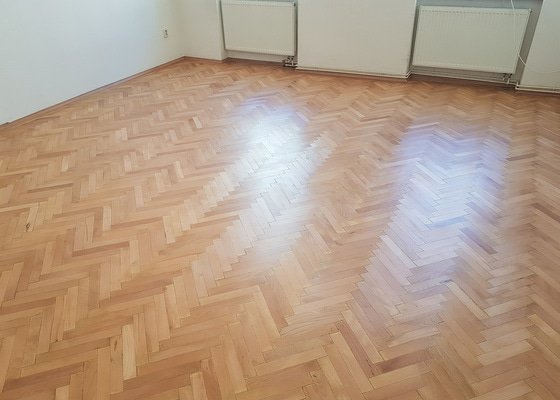 Renovace (bukových) parket ve 2 pokojích nájemního domu .